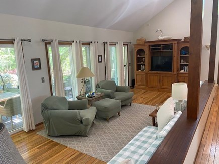 New Seabury Cape Cod vacation rental - Living Room with TV and Sliders leading out to the Back Patio
