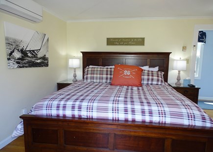 West Dennis Cape Cod vacation rental - Third king bedroom with TV, door to back deck 