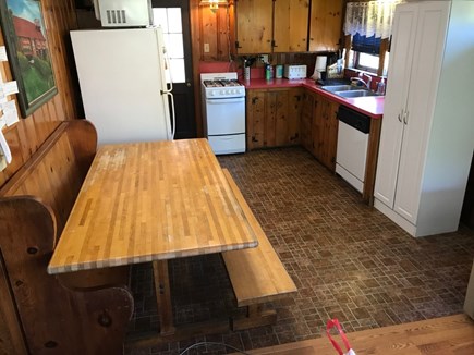 Eastham Cape Cod vacation rental - Full kitchen with gas stove and dishwasher, table eat in kitchen