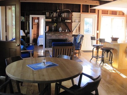 Brewster Cape Cod vacation rental - Open dining/living rooms with fireplace