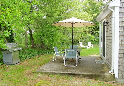 South Chatham Cape Cod vacation rental - Back yard area with outdoor shower, grill 