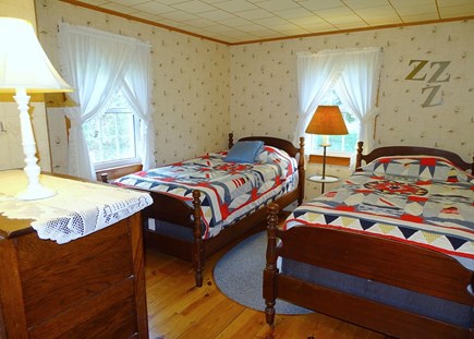 South Chatham Cape Cod vacation rental - Twin bedroom with antique beds and bureau