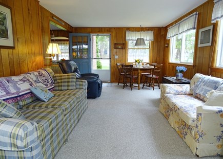 South Chatham Cape Cod vacation rental - Family room opens to dining area, slider to back porch