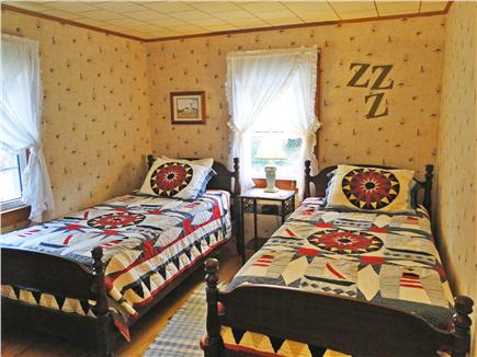 South Chatham Cape Cod vacation rental - Twin bedroom with antique beds and bureau