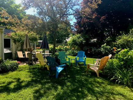 West Harwich Cape Cod vacation rental - Lovely landscaping - Patio off kitchen wtables/grill & Chill area
