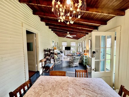 West Harwich Cape Cod vacation rental - Porch w TV & Larger dining table