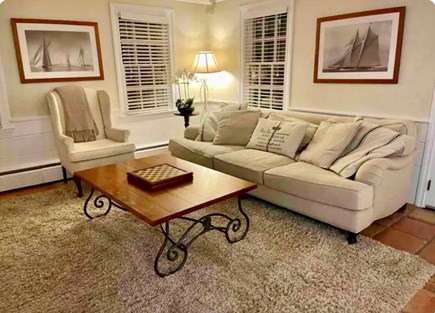 East Falmouth in the historic  Cape Cod vacation rental - Family room w/65” smart TV DVD library, books and games