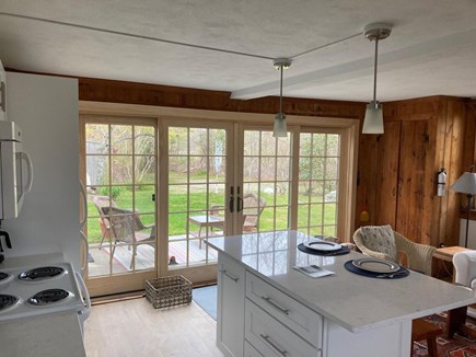 Woods Hole Cape Cod vacation rental - New kitchen with nice eating island and small table facing views