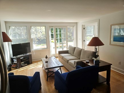 Chatham Cape Cod vacation rental - Sun splashed living room with access to back deck