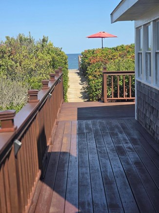 East Sandwich Cape Cod vacation rental - View from side of house deck looking out to beach and dune deck