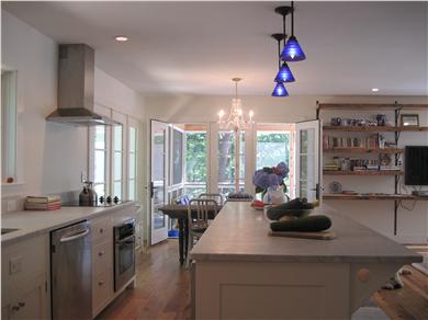 Eastham Cape Cod vacation rental - Kitchen looking towards the dining room and screened porch