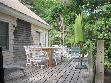 Eastham Cape Cod vacation rental - Back deck with seating for 8 and Adirondack chairs