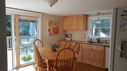 Chatham Cape Cod vacation rental - Sunny granite kitchen with maple cabinets. Slider to deck