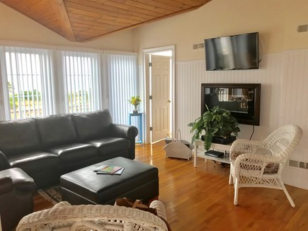 West Yarmouth, MA Cape Cod vacation rental - Open Space Living Room Furnishings with newly finished flooring.