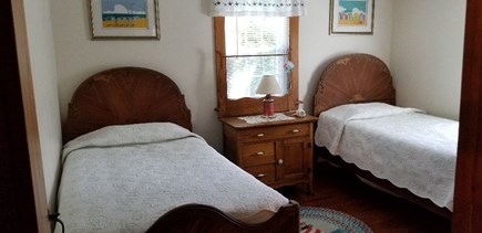West Yarmouth Cape Cod vacation rental - Second bedroom with antique twin beds.
