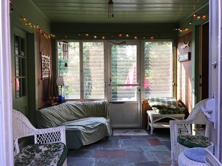 Hyannis Cape Cod vacation rental - Wicker-Furnished Breezeway with Jealousy Windows.