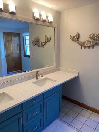 West Dennis Cape Cod vacation rental - Hall bathroom with new faucets,quartz countertop and lights