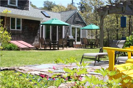 Brewster, The Highlands Cape Cod vacation rental - Well landscaped backyard with privacy fencing.