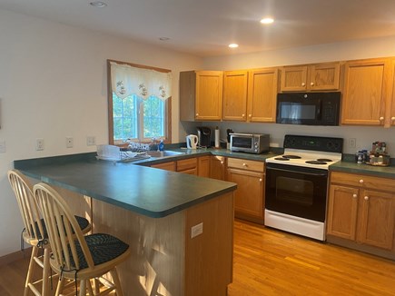 Wellfleet Cape Cod vacation rental - Kitchen with bar<br/>