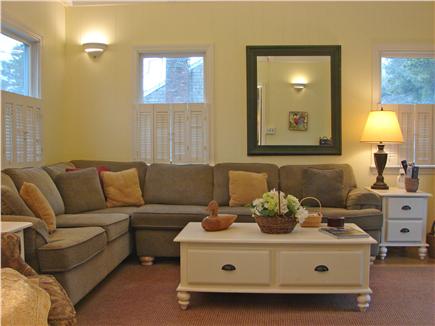 East Falmouth Cape Cod vacation rental - Family room adjacent to kitchen with TV, DVD and slider to deck