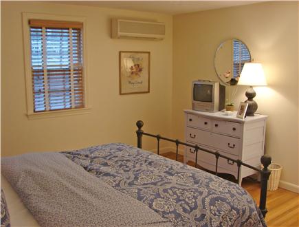 East Falmouth Cape Cod vacation rental - Upstairs large queen bedroom with wood floors and ceiling fan