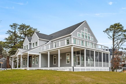 West Dennis Cape Cod vacation rental - Another view of house showing it's many windows and features