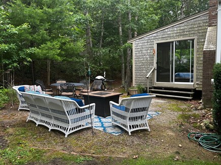 Brewster Cape Cod vacation rental - Outdoor Seating with gas fire and table for 6-8