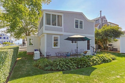 Provincetown, East End Cape Cod vacation rental - Backyard with a glimpse of the harbor across the street