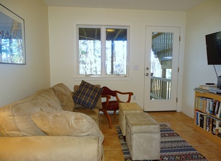 Wellfleet, Indian Neck Cape Cod vacation rental - TV and lounge area, opens to back yard