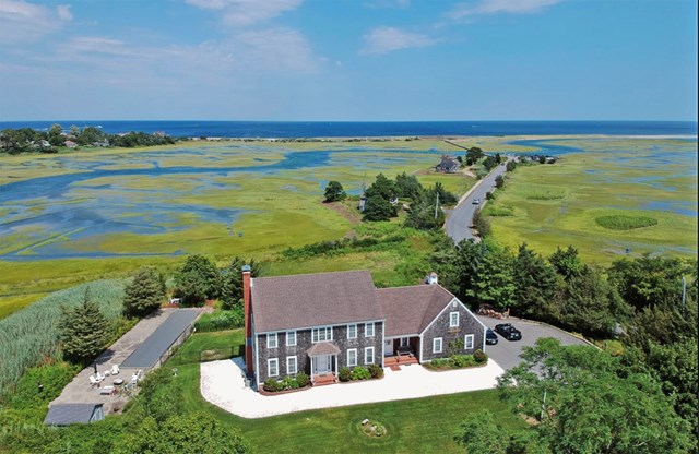 Light-Filled Cape Cod House Surrounded by Water