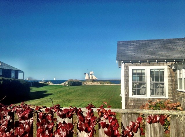Water views and private beach from this Brant Point cottage