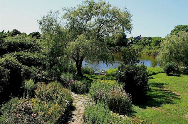 Secluded estate on 3 Acres with house, cottage, and pond