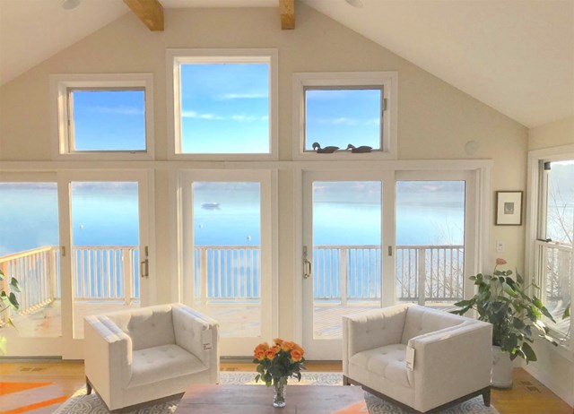 Commanding lagoon waterfront home with private beach