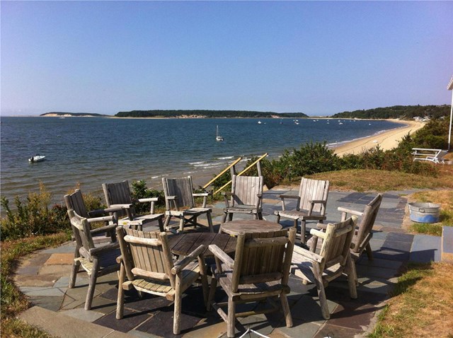 Amazing waterfront home with wide porch and private beach