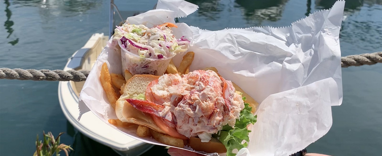 A born-and-raised Cape Cod local shares her favorite lobster rolls — from Bourne to Provincetown, cold with mayo to warm with butter, and even a lobster roll cruise. Updated every year.