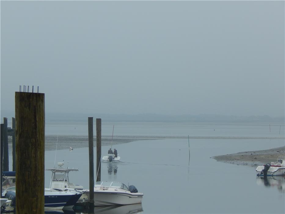 Barnstable Harbor was foggy and quiet the morning left for home. 