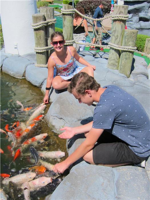 Cape Escape Golf, Orleans.
Feeding the Koi at the end of the round of mini golf!
