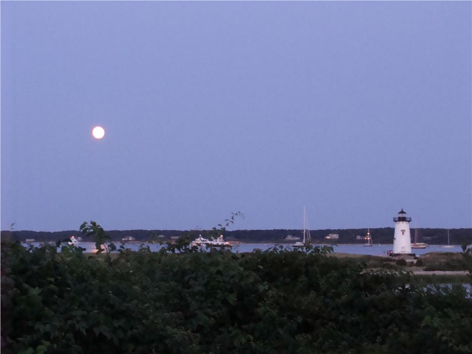 Full moon over the lighthouse in Edgartown