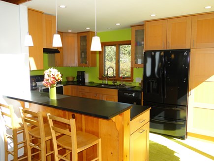 West Tisbury, Stoney Hill Lane Martha's Vineyard vacation rental - Newly refinished kitchen area w/ breakfast bar and slider to deck