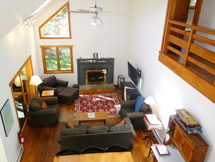 West Tisbury, Stoney Hill Lane Martha's Vineyard vacation rental - Lofted Living room with skylights, fireplace, and slider to porch