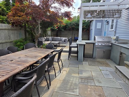 2 Pocasset Avenue, Oak Bluffs  Martha's Vineyard vacation rental - Back patio with outdoor kitchen, seating for 14, and outdoor sofa