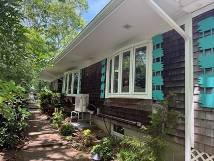 Edgartown Martha's Vineyard vacation rental - Side of the house walkway to back deck and front door entry
