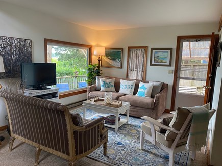 Oak Bluffs Martha's Vineyard vacation rental - Sunny living room with large window looking towards pond & ocean.
