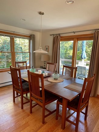 Oak Bluffs Martha's Vineyard vacation rental - Dining area with sliding door to deck with outdoor dining table.