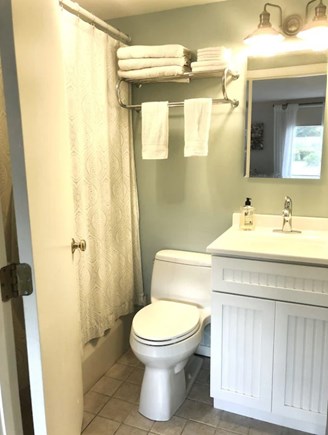 Oak Bluffs Martha's Vineyard vacation rental - Petite en suite primary bath with tub/shower