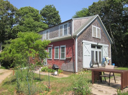 Chilmark Martha's Vineyard vacation rental - Gas grill (center), lawn furniture, with view of bedroom dormers