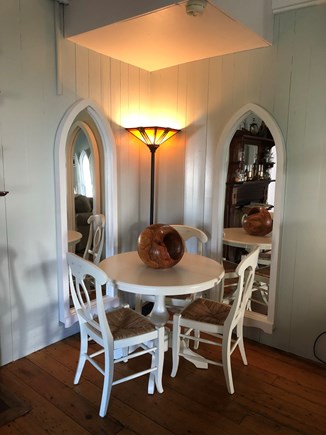 Oak Bluffs Martha's Vineyard vacation rental - Card table for four with arched mirrors that match the windows.