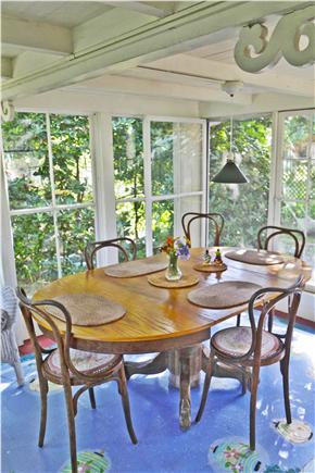 Oak Bluffs Martha's Vineyard vacation rental - Airy dining room looks out on ivy, shady bushes and birdfeeder.