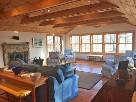 Chilmark Martha's Vineyard vacation rental - LR's local fieldstone FP and full wall of waterview windows.