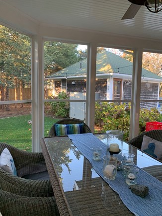 Oak Bluffs, East Chop Martha's Vineyard vacation rental - Screened in porch, with eating area and guest house behind